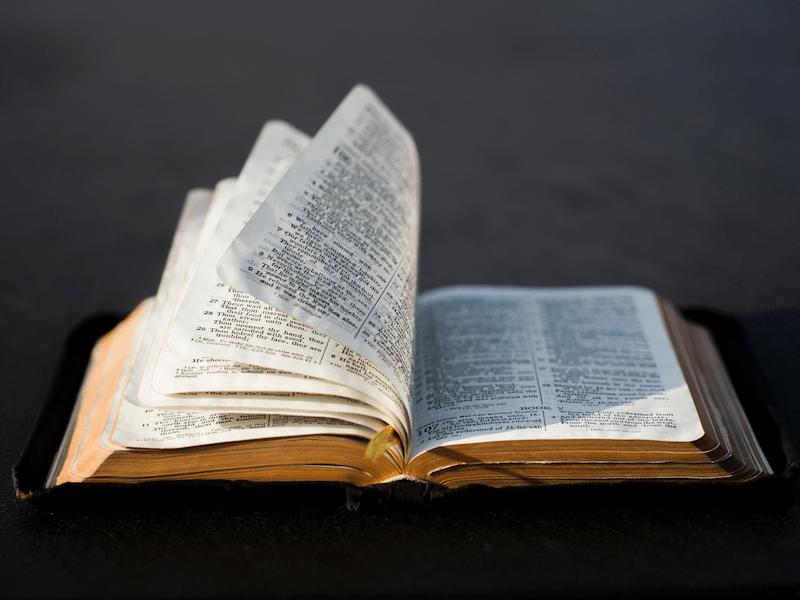 A Bible is open to the scripture about Jireh provides.